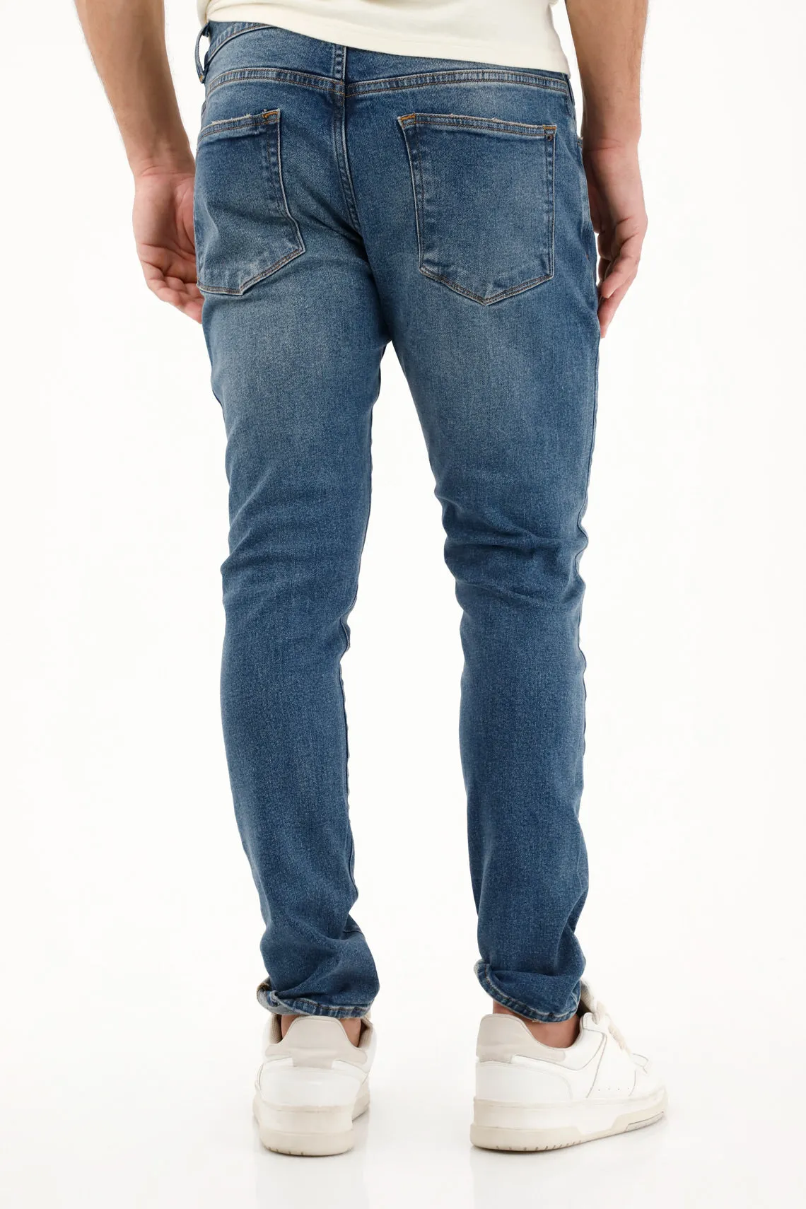 Jean Skinny tiro medio con roto localizado para hombre